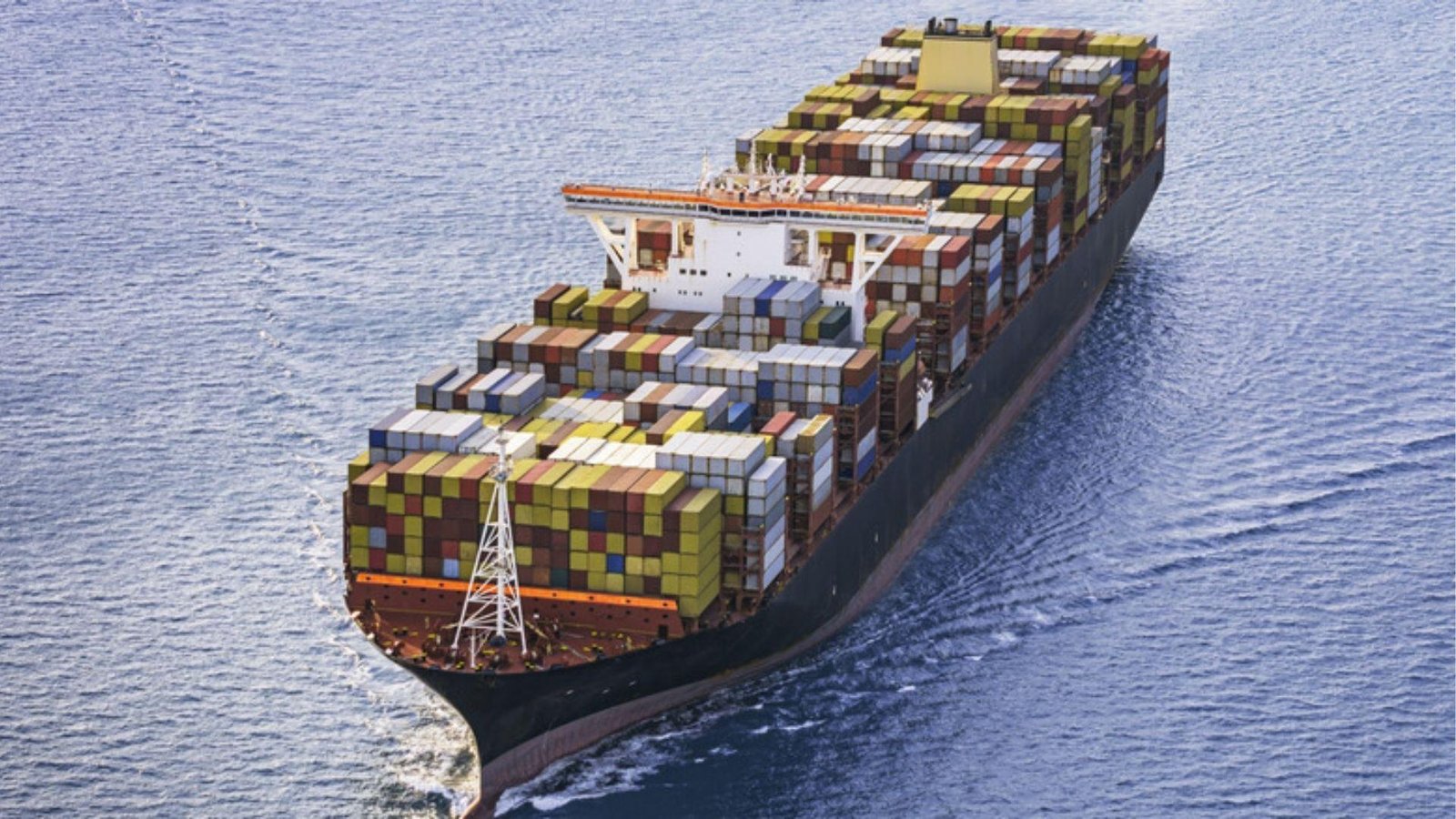 Side view of Maersk container vessel at sea, demonstrating how mega-ships hold vast cargo.